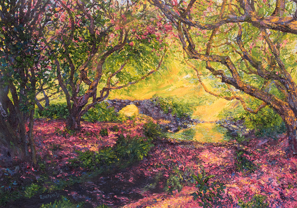 Intensely coloured scene with trees, water and a bridge. Warm yellows and oranges beyond the bridge, purples and oranges illuminate tree structures, hints of pale blue throughout, dominated by bright pinks across the lower part of the scene and among tree canopies, suggesting a blossom display.